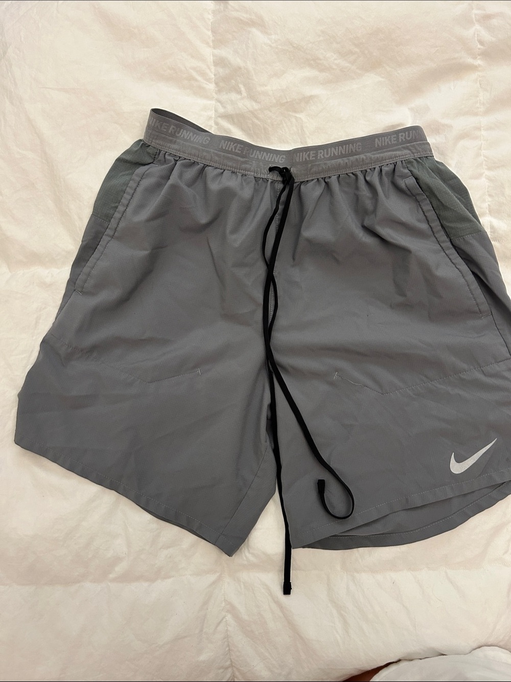 Nike Men's Gray Athletic Running Shorts with Black Drawstring